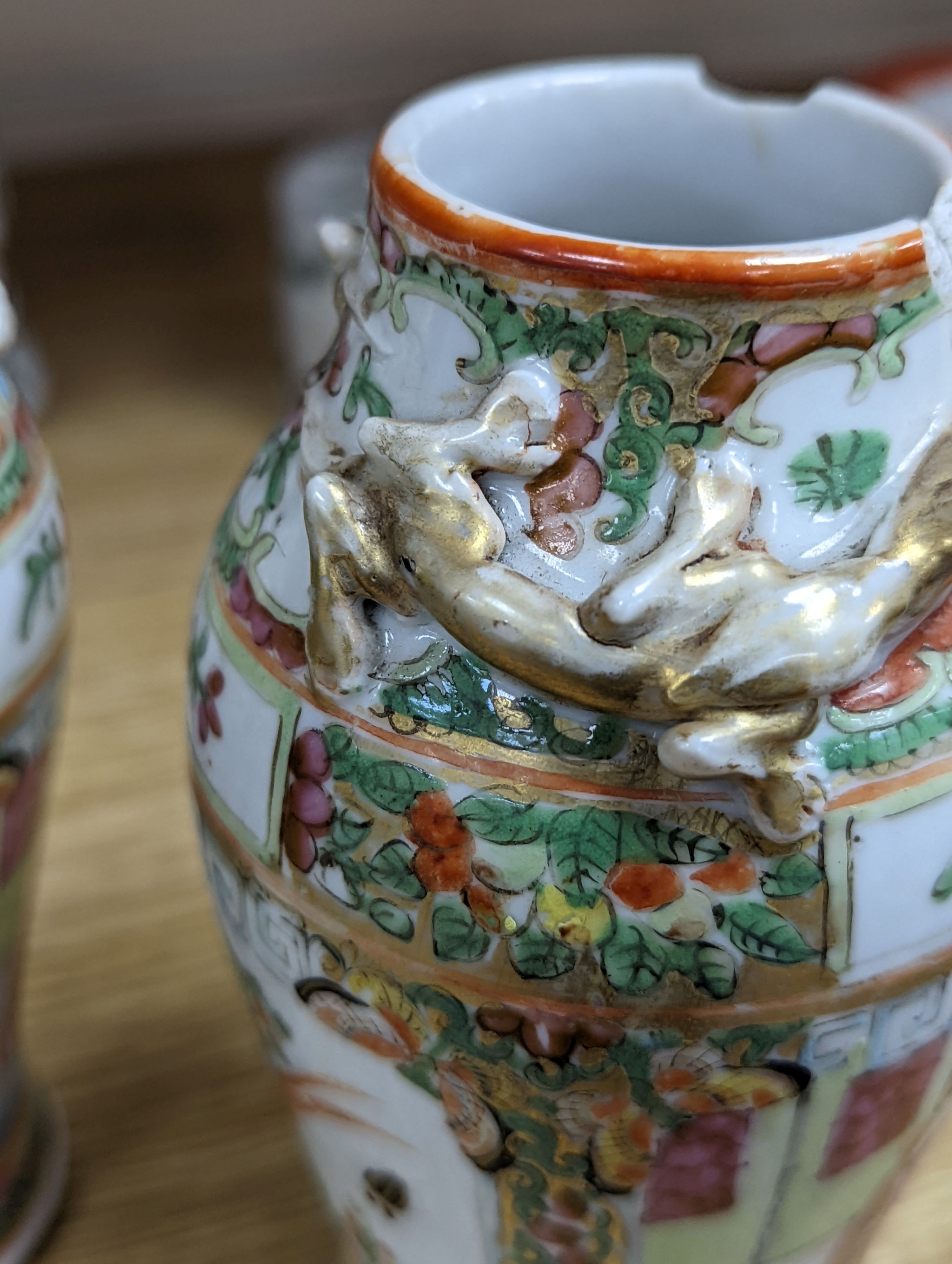 A group of Chinese famille rose vases and jars, a box and cover and a teapot, 19th/20th century, Pair of vases 13 cms high.